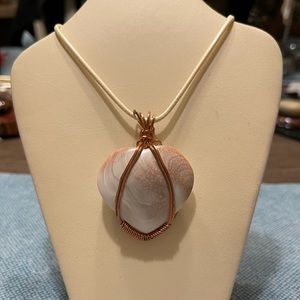 Hand wrapped Shiva Shell Pendant in Copper wire
